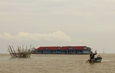 People on boat in sea