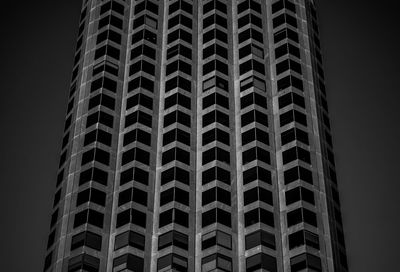 Low angle view of illuminated building at night