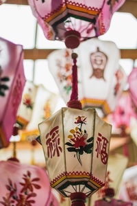 Low angle view of cross decoration at temple