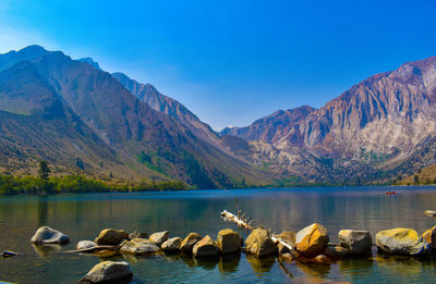 Enchanted picturesque alpine mountains above crystal clear blue lake