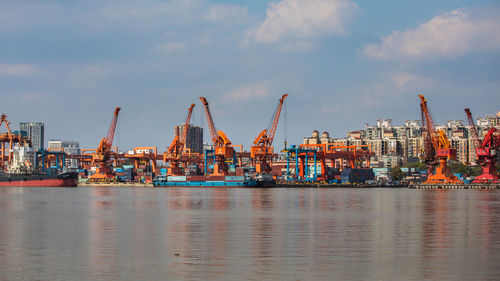 View of commercial dock against sky
