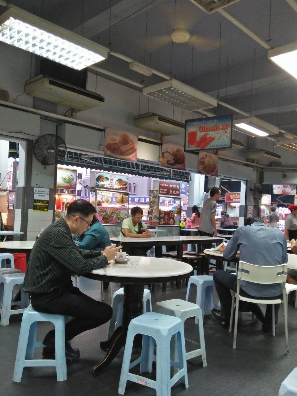 GROUP OF PEOPLE AT RESTAURANT