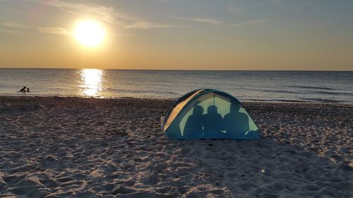 Scenic view of sea at sunset