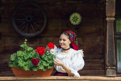 Portrait of a woman with flower bouquet