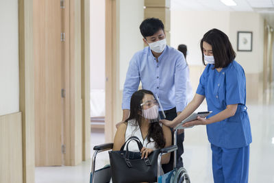 Women standing in corridor