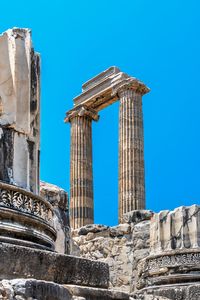 Low angle view of old ruins against clear sky