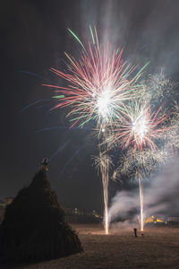 Ancient tradition of epiphany fires in friuli. pignarûl and fireworks.