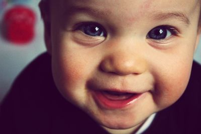 Close-up portrait of cute baby girl