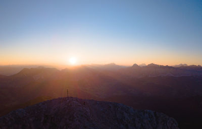 Scenic view of mountains against sky during sunset