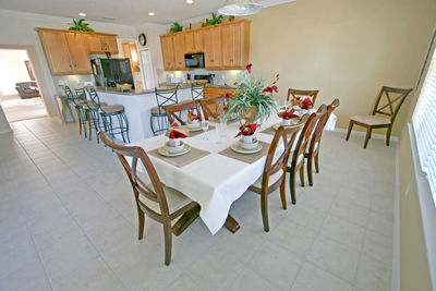 Empty chairs and tables in restaurant