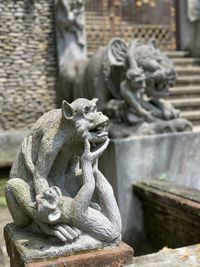 Monkey statue in a temple in bali