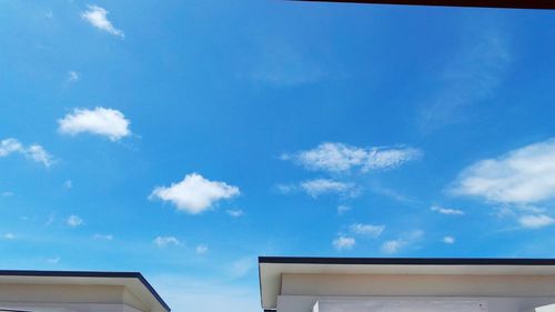 Low angle view of built structure against blue sky