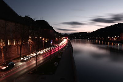 Traffic light trails on road at night