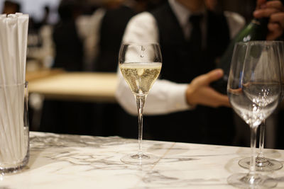 Close-up of wine glass on table