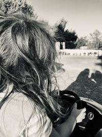 Close-up portrait of woman holding umbrella