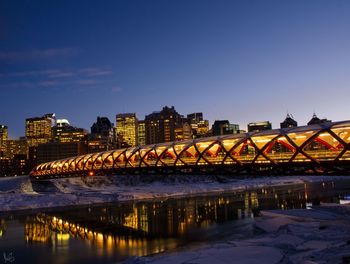 Bridge over river at night