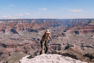 Full length of man on rock