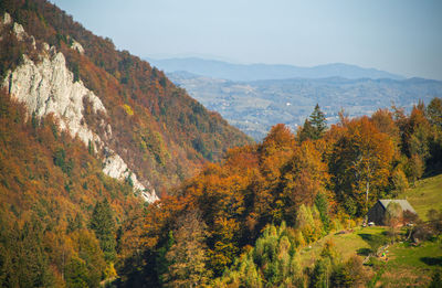 Scenic view of mountains during autumn against sky