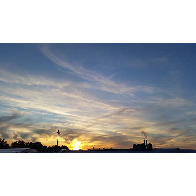 sunset, sky, silhouette, built structure, transfer print, sun, architecture, building exterior, scenics, cloud - sky, tower, auto post production filter, beauty in nature, nature, tranquility, orange color, tranquil scene, communications tower, sunlight, cloud