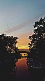 Scenic view of sunset over river