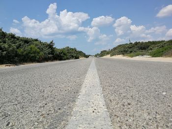 Surface level of road against sky