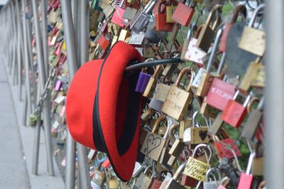 Close-up of padlocks hanging on railing