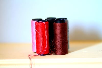 Close-up of red chili peppers on table