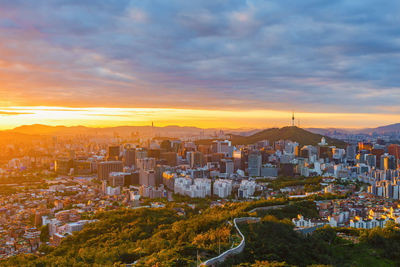 High angle view of townscape against sky during sunset