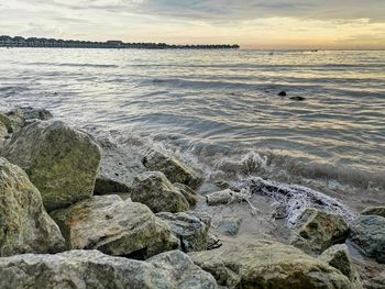 Scenic view of sea against sky at sunset