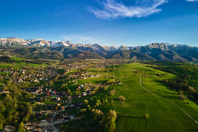 Aerial view of tatra mountains and zakopane town at sunset