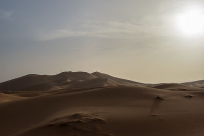 Scenic view of desert against sky