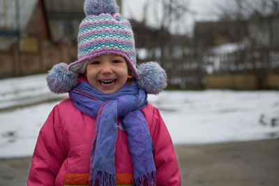 Portrait of young woman wearing warm clothes