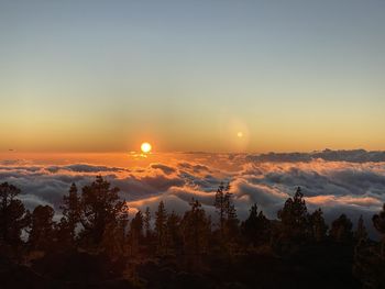 Scenic view of mountains against sky during sunset