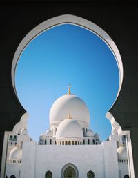 View of mosque against clear sky