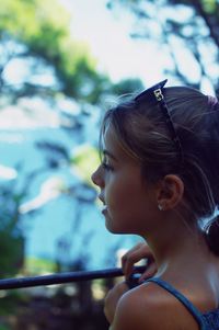 Portrait of young woman looking away