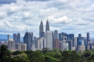 View of buildings against cloudy sky