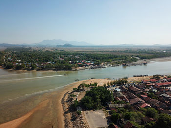 High angle view of bay against clear sky