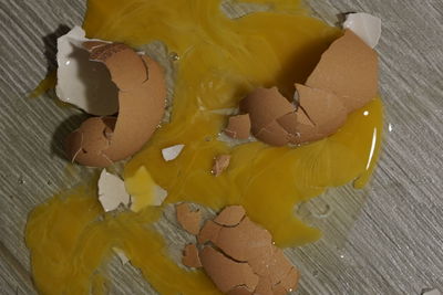 Close-up of yellow bread on wooden table