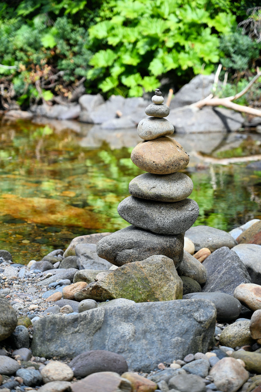 STACK OF PEBBLES ON ROCKS