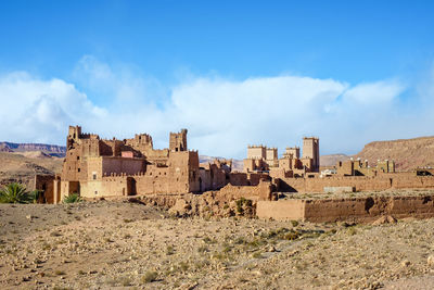 Mud kasbah buildings at ksar of tamedakhte, ouarzazate province, morocco