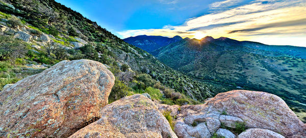 Rock formations on landscape against sky