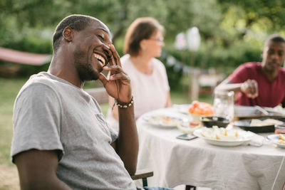 Men sitting on table