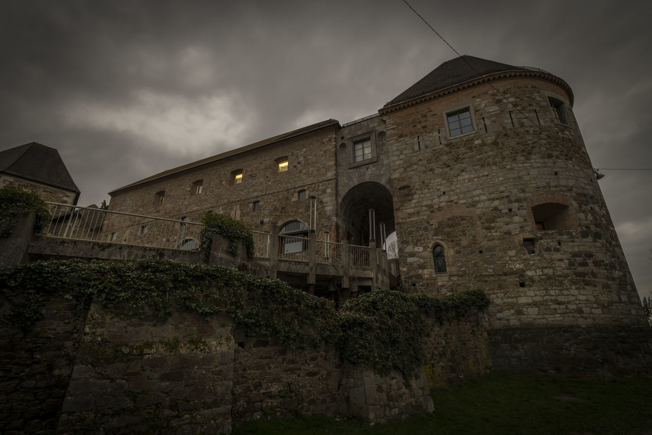 architecture, built structure, building exterior, sky, history, cloud, the past, building, castle, low angle view, nature, darkness, old, night, no people, ruins, travel destinations, ancient history, dusk, medieval, old ruin, outdoors, overcast, house, wall, storm, ancient, fort, dark, fortification, travel