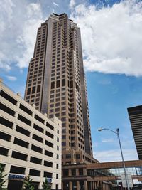 Low angle view of modern buildings against sky