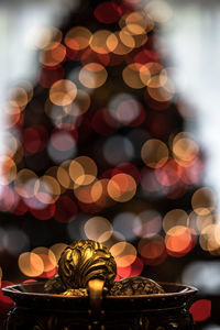 Close-up of illuminated decoration on table