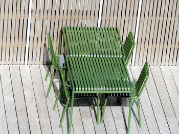 High angle view of empty chairs on table