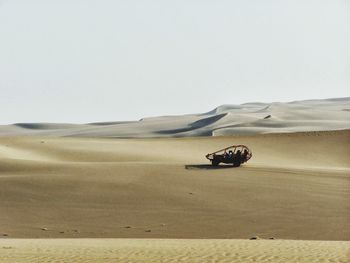 Dune buggy in desert