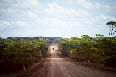 Empty road against sky