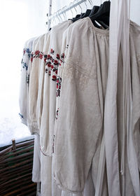 Low angle view of clothes hanging on wall