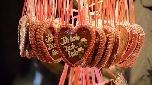 Close-up of decoration hanging against black background